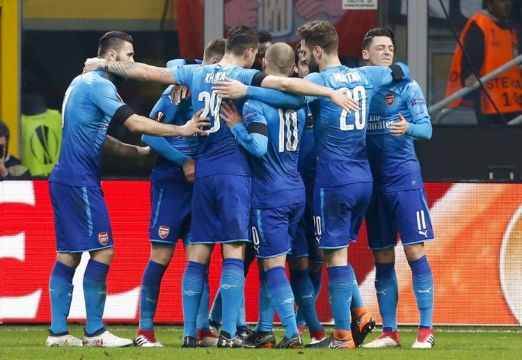 Arsenal ended a torrid run of football games defeat with a comfortable victory over AC Milan