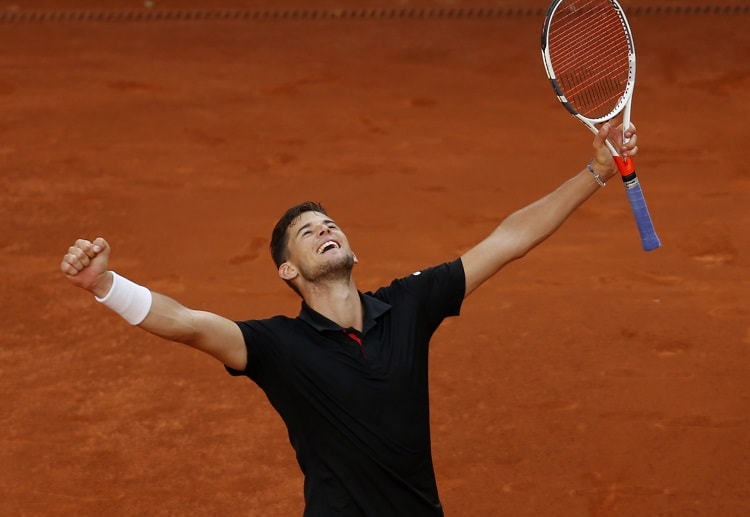 Dominic Thiem celebrates his victory following his live betting win against Rafael Nadal