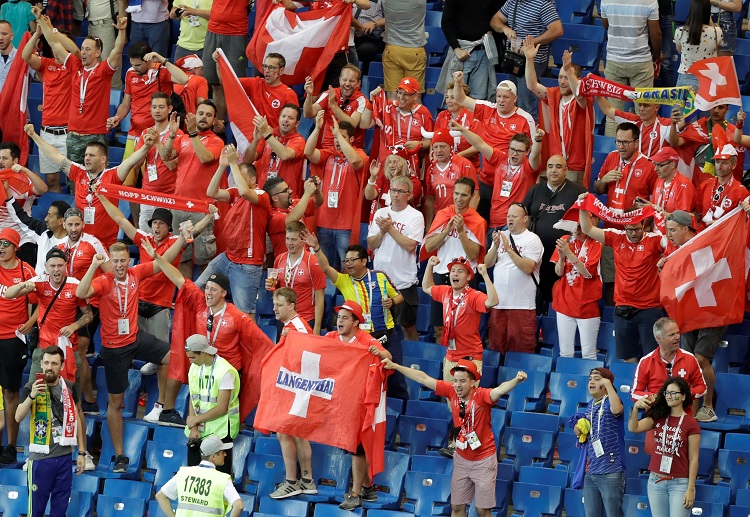Swiss fans celebrates the progression of Switzerland to the knockout rounds of FIFA 2018