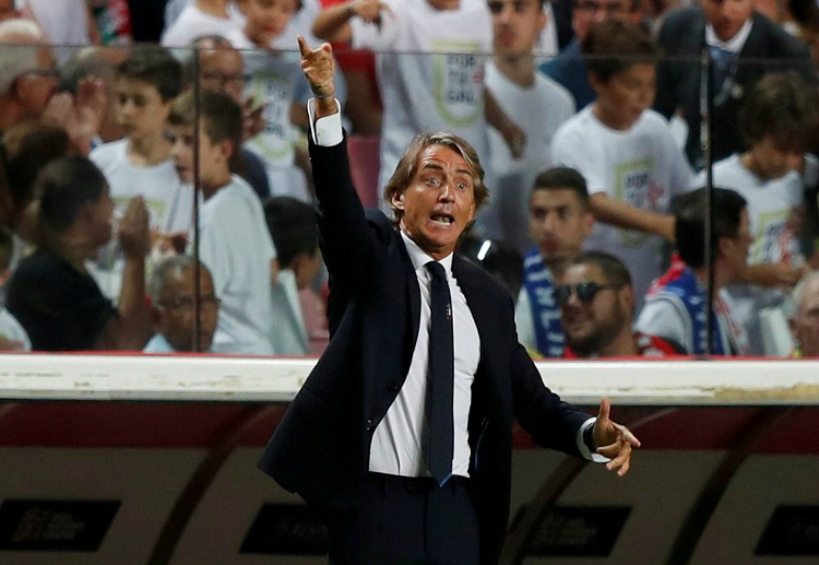 Italy coach Roberto Mancini reacts at the touchline during their match against Portugal