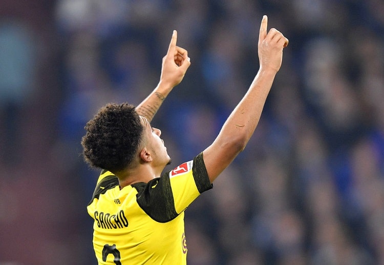 Dormund's Jadon Sancho celebrates scoring against Schalke in Bundesliga