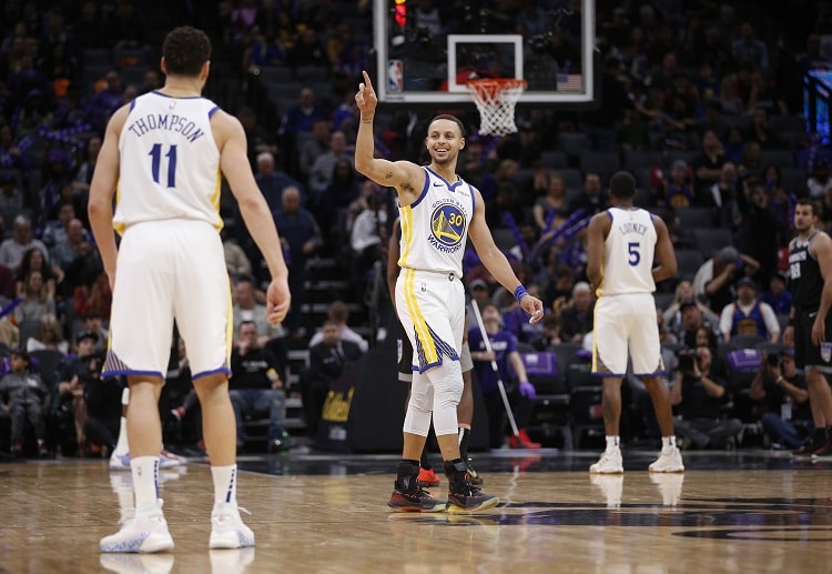 Steph Curry spearheads GSW to seal a tight 127-123 win against Sacramento Kings in recent NBA game