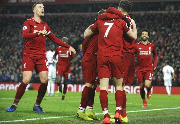 Naby Keita celebrates with teammates during the Premier League match vs Palace