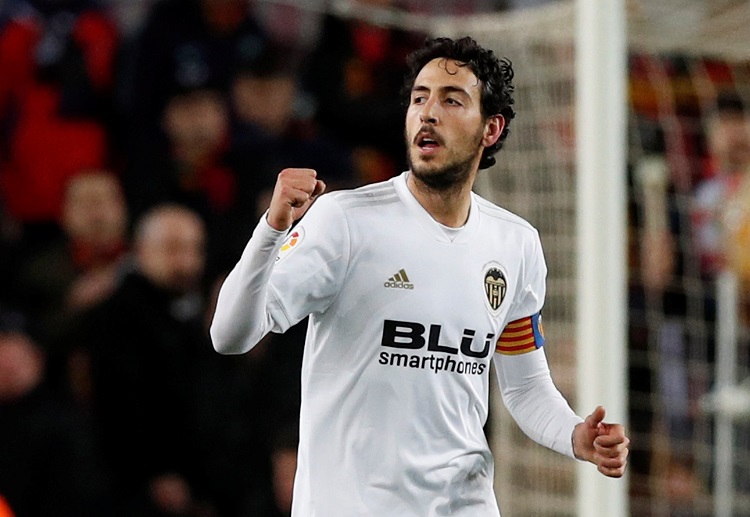 Daniel Parejo’s penalty goal increased their lead over Barcelona in the first half of their La Liga clash