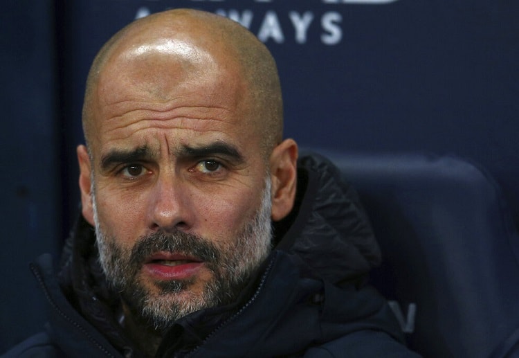 Pep Guardiola refuses to give up on Man City's hopes of retaining the Premier League title