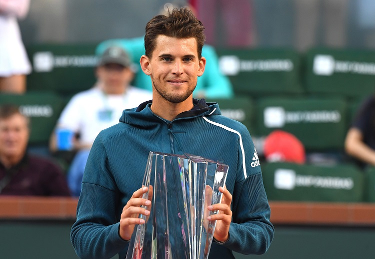 Dominic Thiem lifts the Indian Wells Masters trophy after a three sets win against Roger Federer