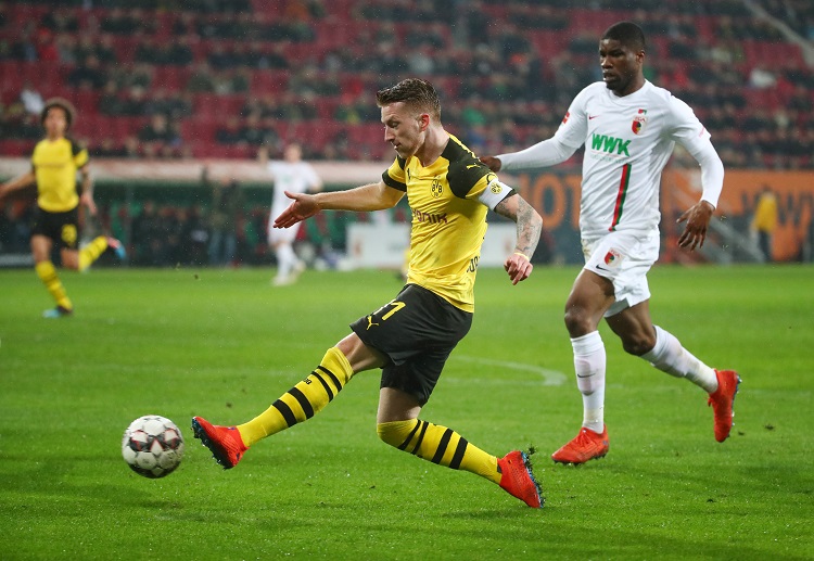 Returning Marco Reus unable to chance goals for Dortmund in Budesliga match against Augsburg in WWK Arena