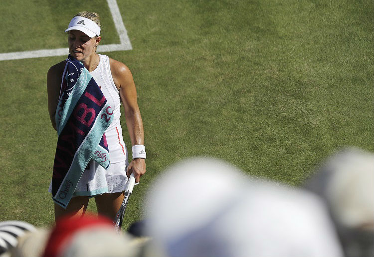 Angelique Kerber’s Wimbledon title defence came to an end after losing to Lauren Davis