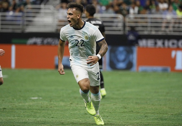Lautaro Martinez celebrates after scoring a hat-trick for Argentina in an amazing international friendly win over Mexico