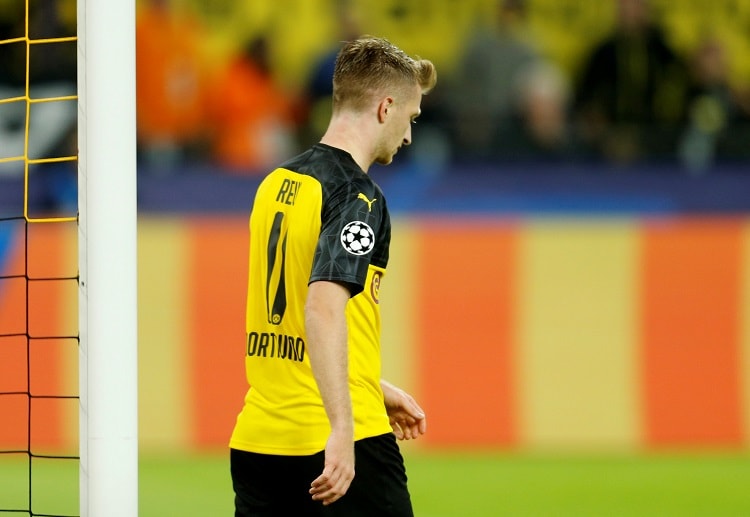 Barcelona hold Borussia Dortmund to a goalless draw after saving Marco Reus' second-half penalty