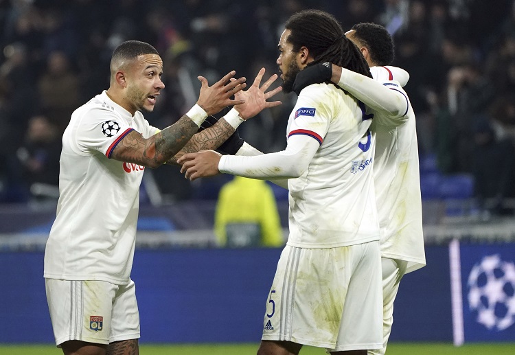 Lyon forward Memphis Depay strikes late equaliser to qualify for Champions League last 16 after victory over RB Leipzig