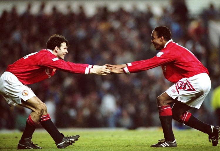 Ryan Giggs celebrates with his Manchester United teammate after a Premier League match