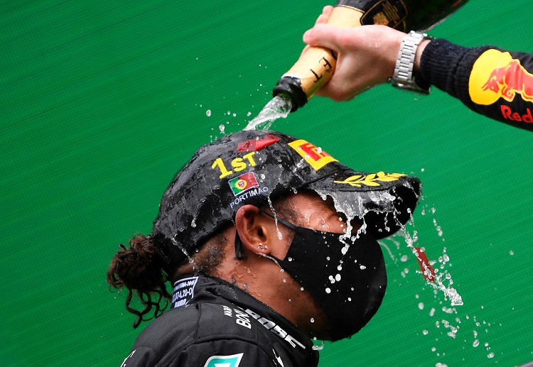 Lewis Hamilton wins the Portuguese Grand Prix and breaks Michael Schumacher's record