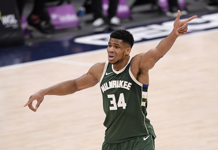Giannis Antetokounmpo reacts during the first half of an NBA match