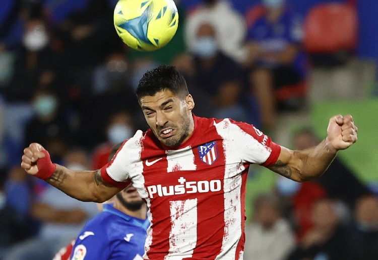 Atletico Madrid's Luis Suarez aims to lead his club to a La Liga glory