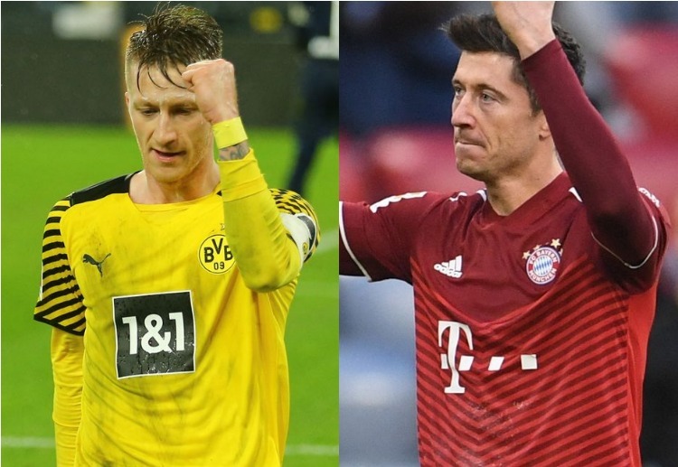 Marco Reus and Robert Lewandowski both celebrate victory in the Bundesliga