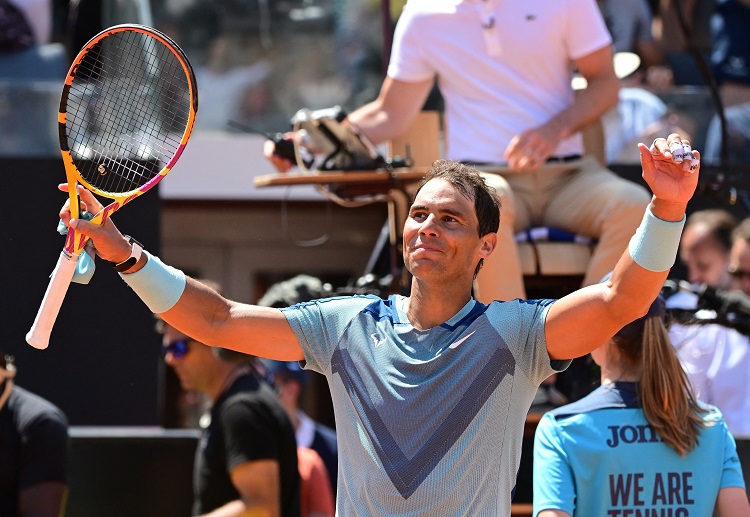 Rafael Nadal eases into the last 16 of the Italian Open after beating John Isner