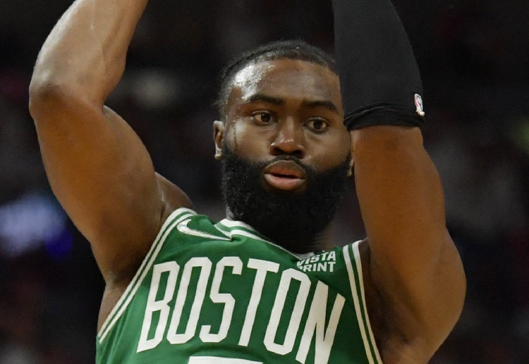 Boston Celtics guard Jaylen Brown is trying to shoot during NBA match against the Miami Heat