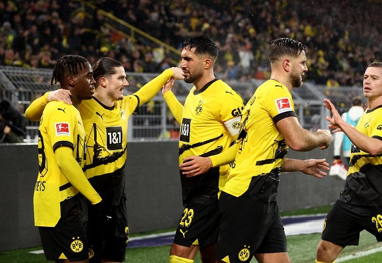 Borussia Dortmund are eager to book their place in the Champions League last-16